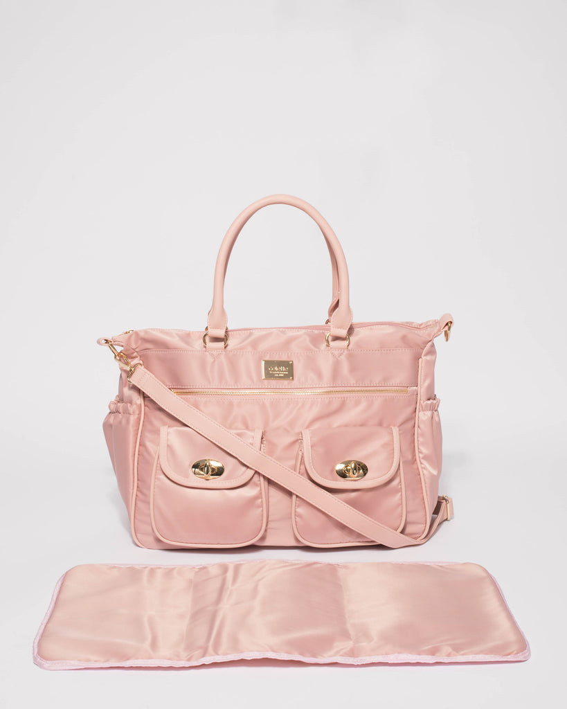 Pink Nylon Travel Baby Bag With Gold Hardware