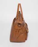 Tan Embossed Baby Travel Bag With Gold Hardware